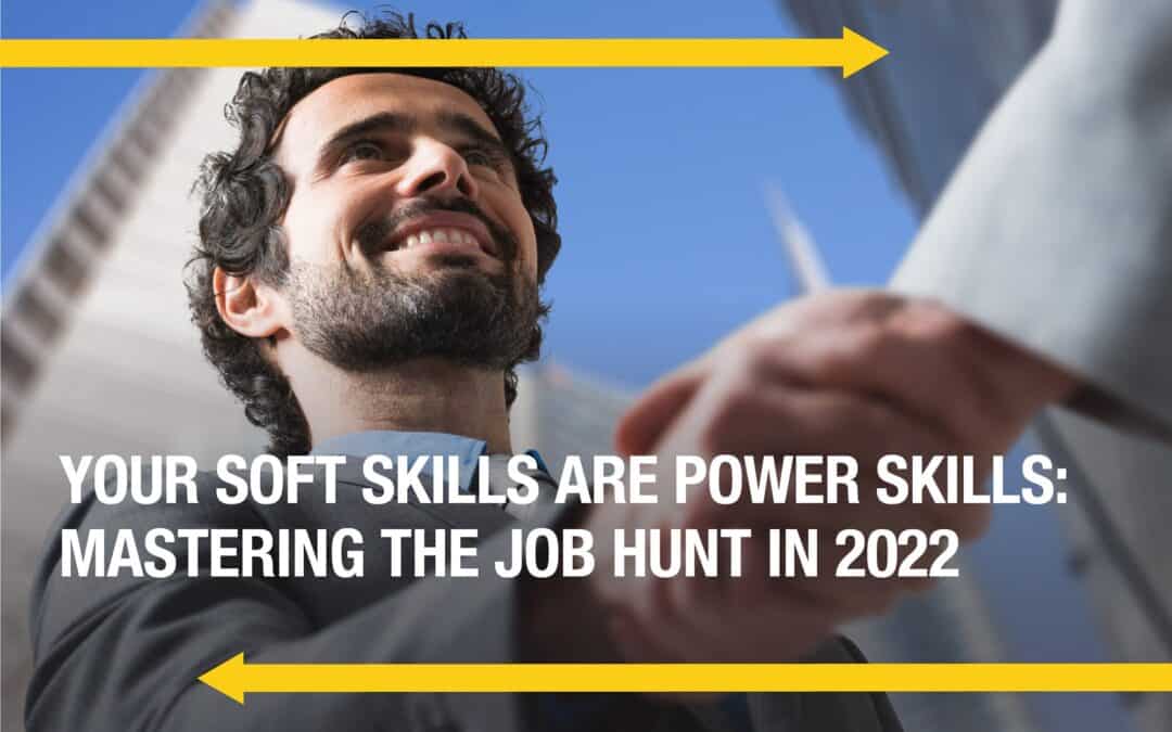 Two yellow arrows go opposite directions with a masculine person with a beard shaking hands with another person not pictured. The caption reads "Your Soft Skills are Power Skills Mastering The Job Hunt in 2022"