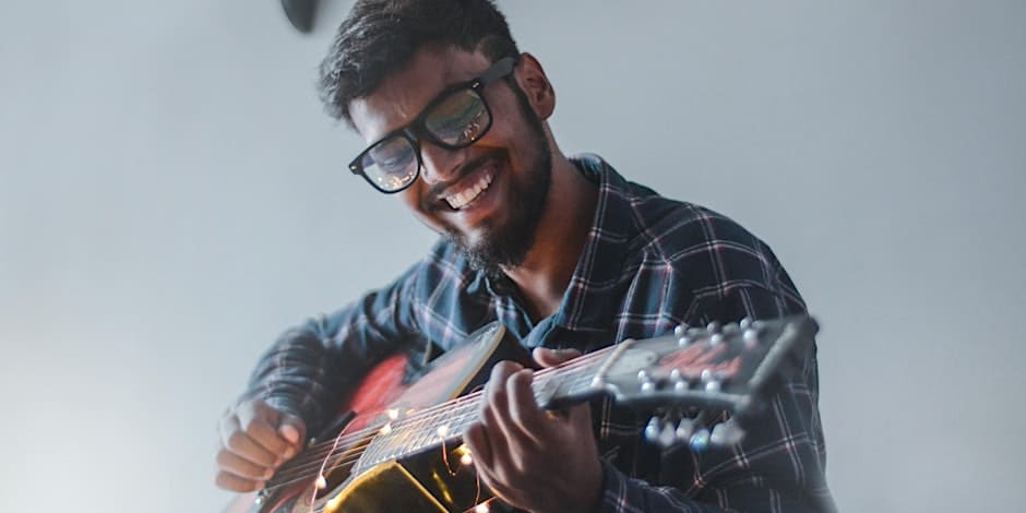 an artist playing a musical instrument learning time management skills